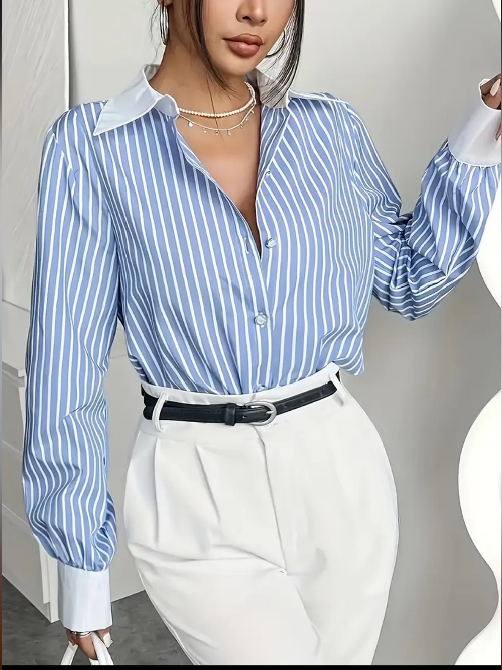 the clothing company Blue & White Striped Button-Down Shirt with White Collar